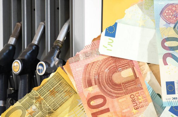 stock photo euro bills gas pump gas station 7QgmxA