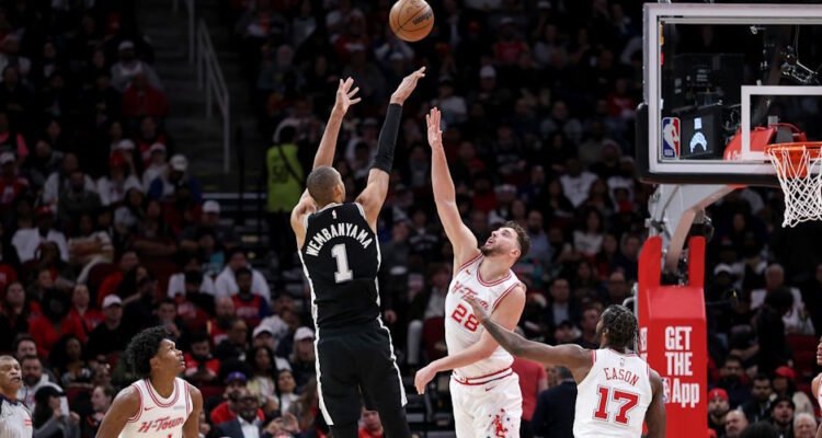c0323db3 victor wembanyama shoots over alperen sengun san antonio spurs at houston rockets